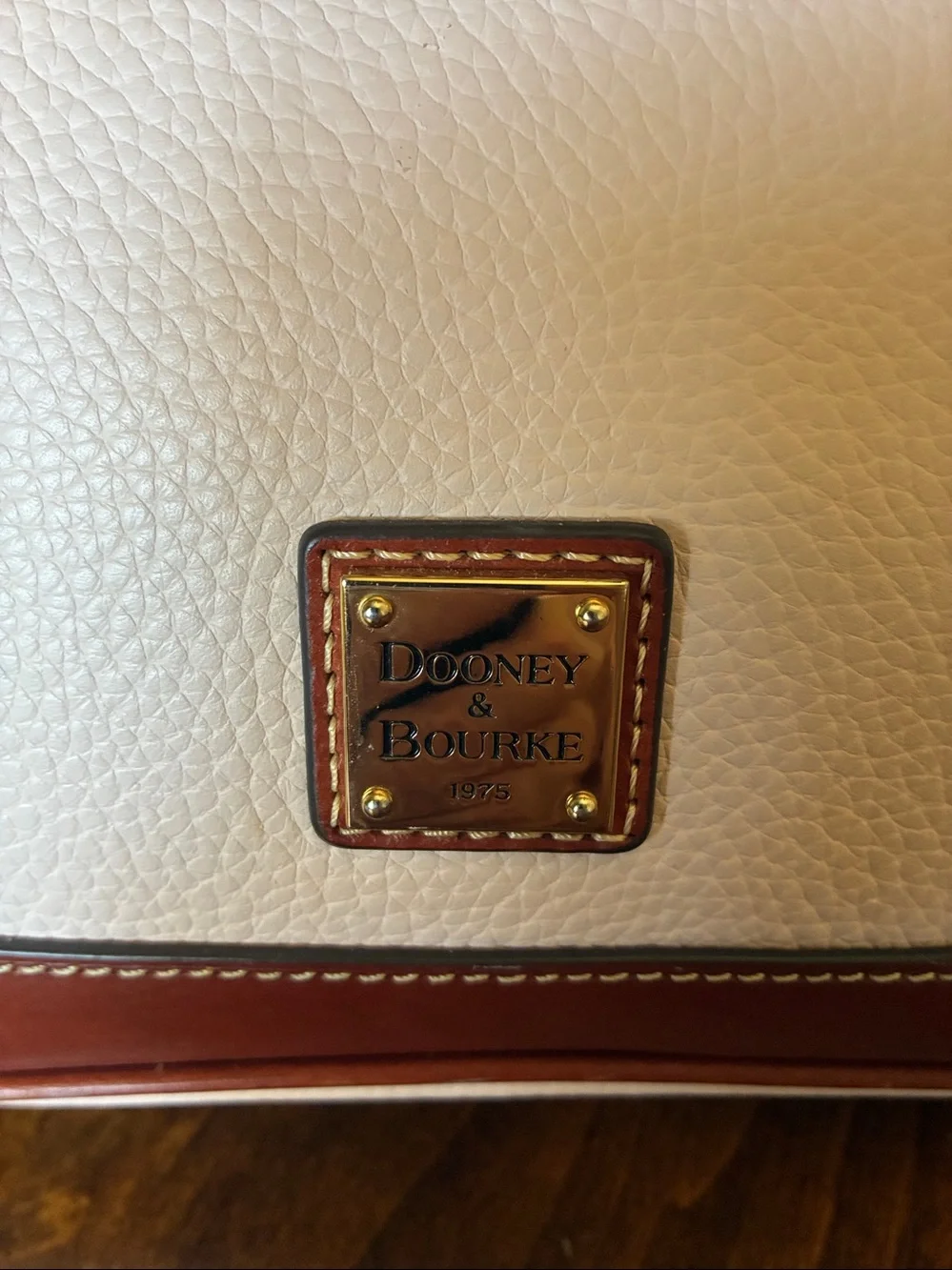 Dooney & Bourke Cream Pebbled Leather Satchel with Brown Trim